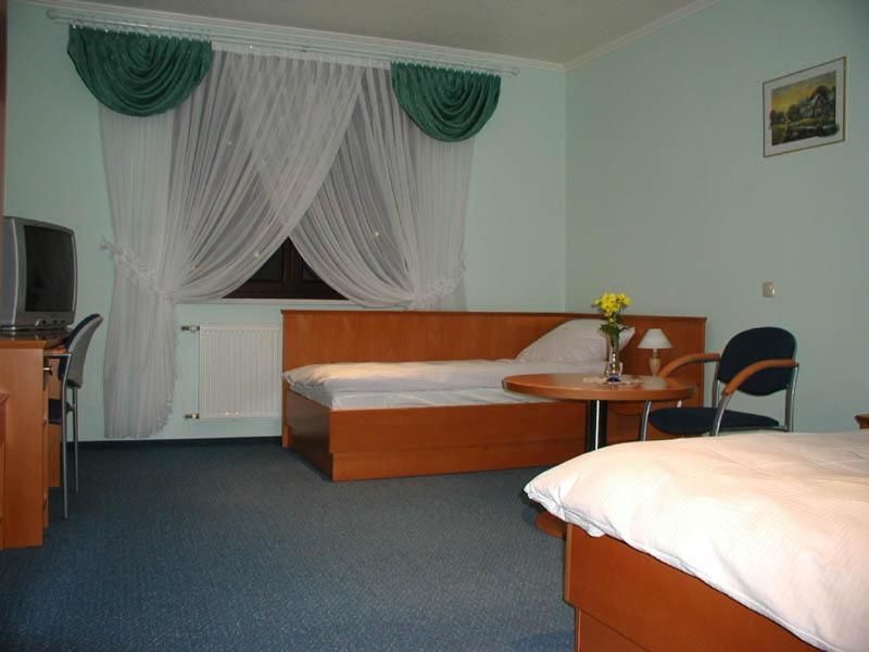 Отель Hotel Restauracja Tawerna Gliwice - ozonujemy pokoje Гливице